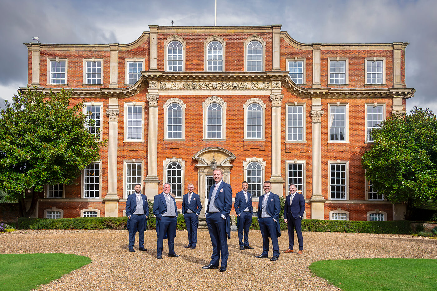 Groom and Groomsmen in front of Chicheley Hall