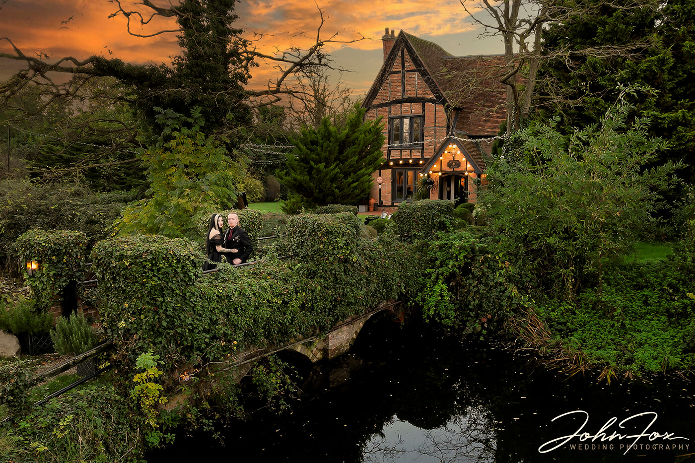 An evening shot of the Gothic couple outside Moreteyne Manor, Bedfordshire