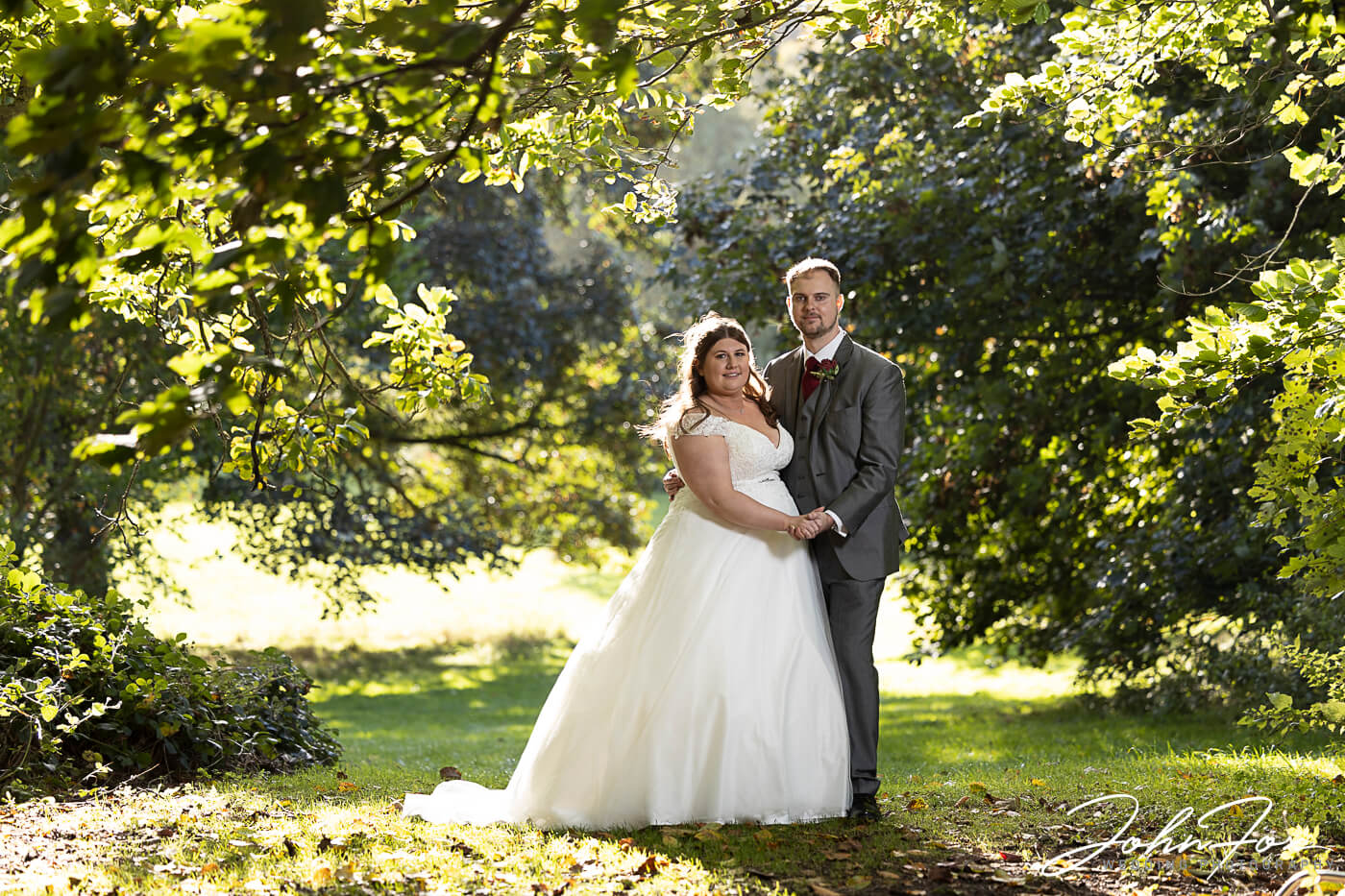 Bride and groom in the grounds and woodland at Magnolia Park on their special day