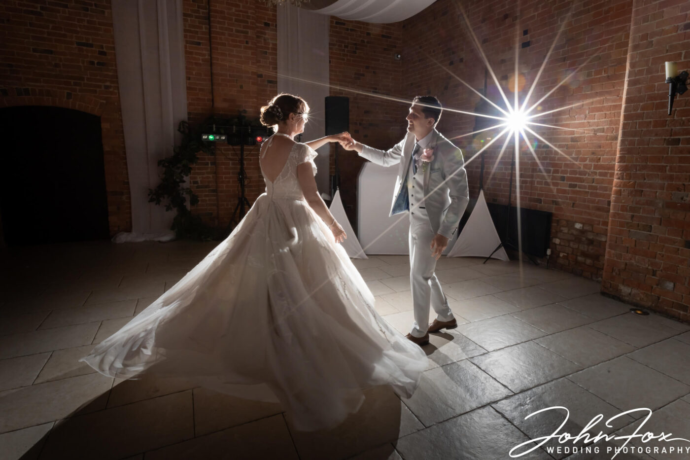 The happy couple take to the dance floor at The Stratford Park Hotel.